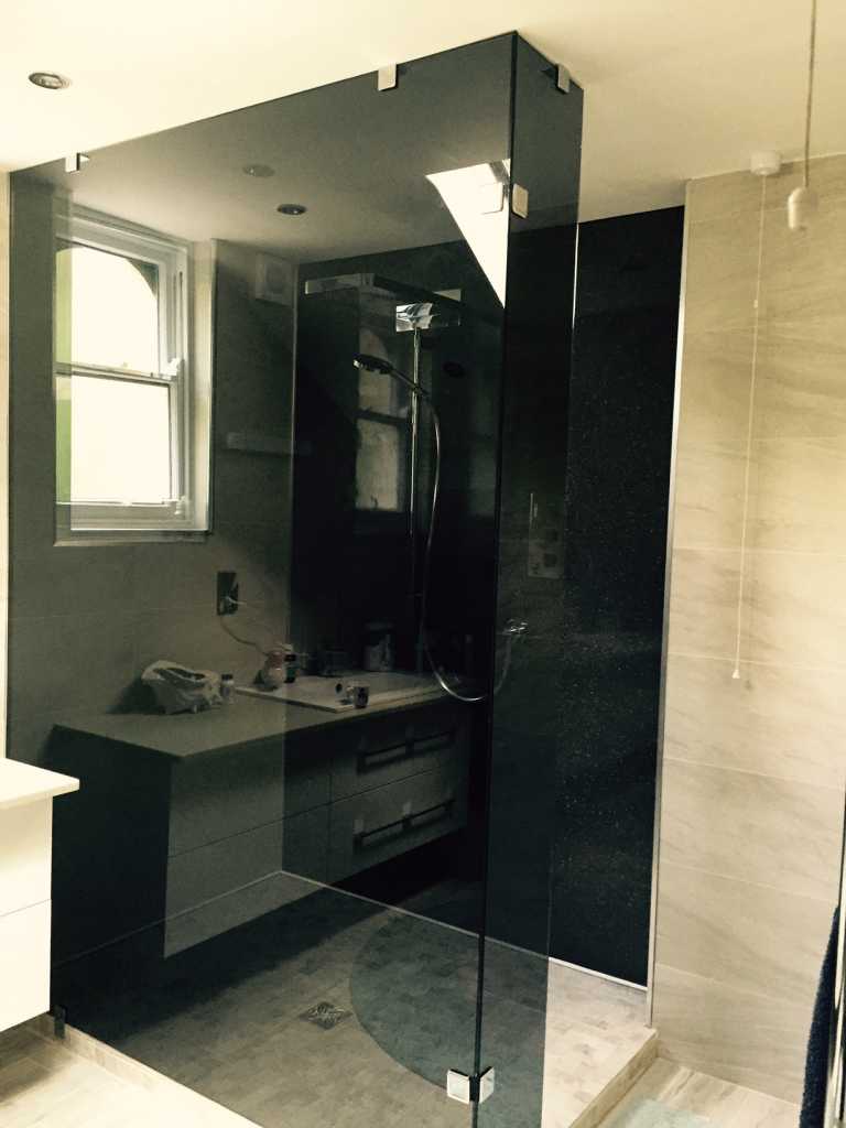 Slightly different to the usual clear shower screen, Mr Johal chose to have his glass in a grey tint to add a modern twist.