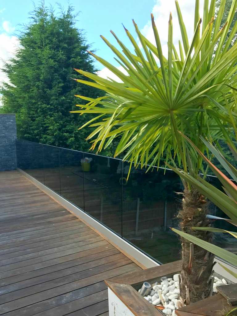 Outdoor decking with glass balustrade