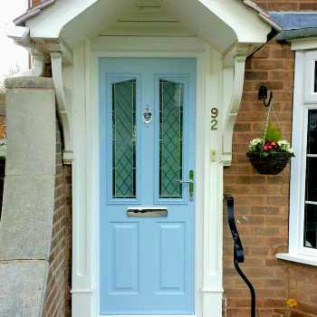 Our customer in Arnold chose to have this beautiful Duck Egg Blue coloured composite door with an elegant brilliant cut glass design.