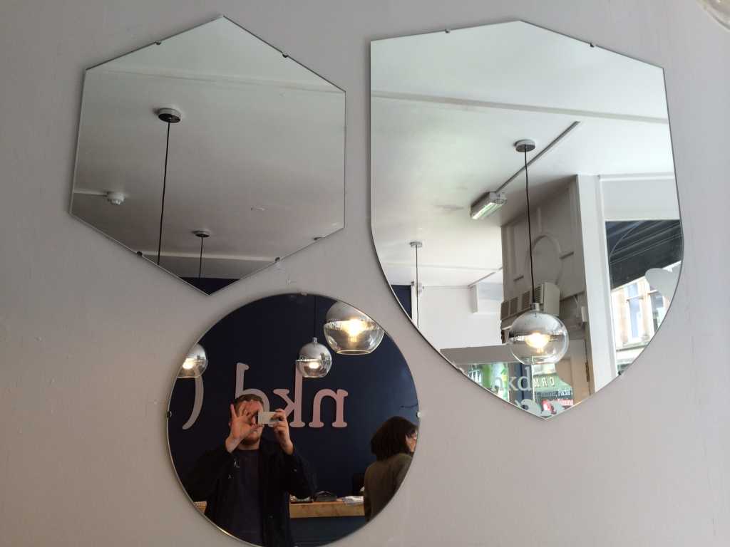Shaped mirrors supplied and installed for NKD Waxing, Nottingham City Centre.