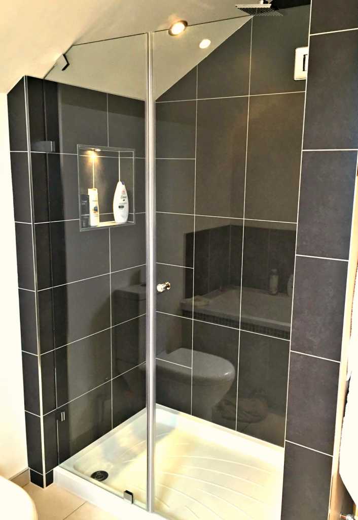 Awkward angles and shapes needn't be a problem! For bathrooms of a more unique nature we simply make MDF templates on site which enable us to replicate the glass exactly as required as part of our bespoke supply and fit service.