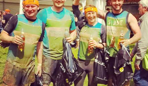 Danny, Ben, Danielle & Shane enjoying a well deserved cider at the Tough Mudder finish line