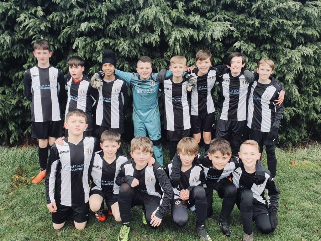 Southwell FC under 12s vipers team wearing new kit sponsored by lee glass